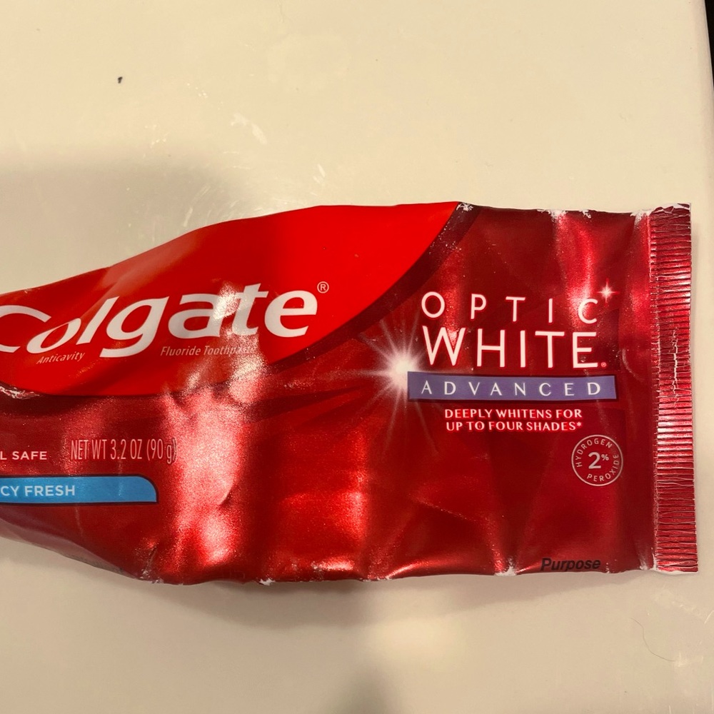Almost completely used colgate toothpaste